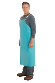 a food processing worker wearing a teal PVC apron from Ansell brand