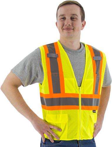 a road worker proudly wearing his high visibility safety vest