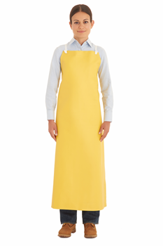 a female factory worker wearing a yellow heavy-duty apron from Ansell brand